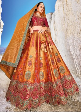 Banarasi Jacquard Silk Orange Wedding Wear Lehenga Choli