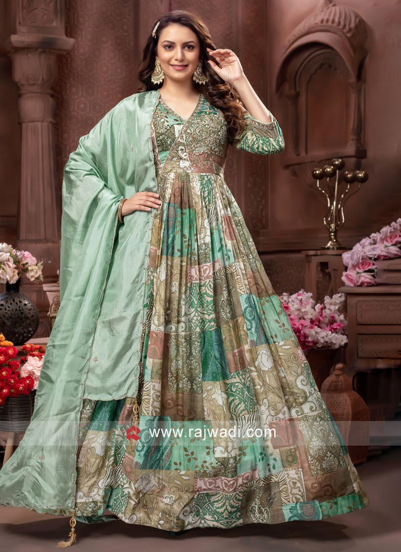 Buy Incredible Sea Green Embroidered Net Anarkali Suit From Zeel Clothing.