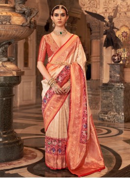 Charming Cream Patola Printed Banarasi Woven Silk Saree
