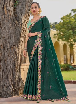 Green Silk Saree With Embroidered Border