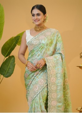 Enchanting Multi Color Banarasi silk Saree With Em