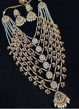 Gold Finish Layered Kundan Necklace With Earrings