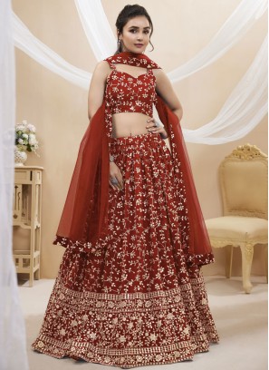 New and Unique Orange Wedding Lehenga Choli with Intricate Embellishments.