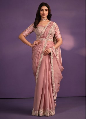 https://cdn.rajwadi.com/image/cache/data-2024/peach-shaded-crepe-satin-sari-with-ready-blouse-53779-297x408.jpg