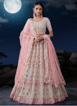 Attractive Off White Embroidered Lehenga Choli In 