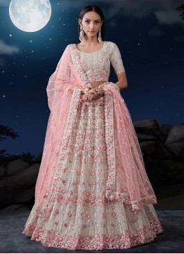 Attractive Off White Embroidered Lehenga Choli In Soft Net