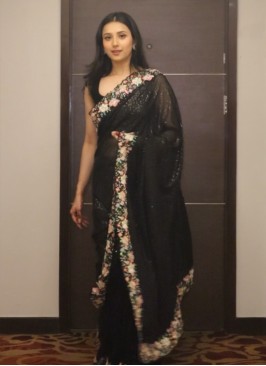 Rimmi in Black Sequin Lycra Net Saree