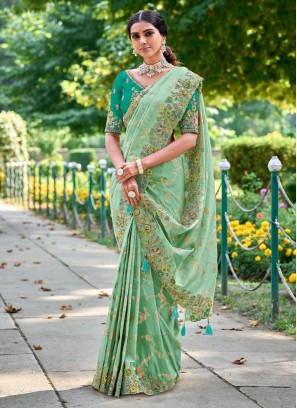 Pista Green Heavy Embroidered Contemporary Silk Saree