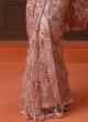 Mesmerising Peach Sequins Embellished Net Saree