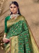 Banarasi Silk Patola Printed Saree In Green Color