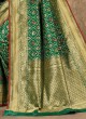 Banarasi Silk Patola Printed Saree In Green Color