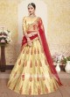 Beige Lehenga Choli with Red Dupatta