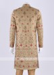 Raw silk sherwani in golden color