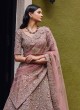 Dusty Rose Pink Heavy Embroidered Net Lehenga Choli