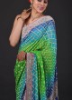 Bandhani Printed Chiffon Saree In Parrot Green And Blue Color