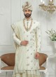 Brocade Silk Anarkali Style Groom Sherwani In Cream Color