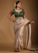 Festive Wear Pure Raw Silk Saree In Golden Cream Color