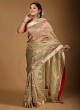 Attractive Golden Pista Color Saree With Zari Weaving Work