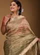 Attractive Golden Pista Color Saree With Zari Weaving Work