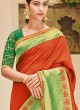 Traditional Red Silk Saree with Green Raw Silk Blouse