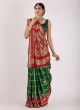 Traditional Green and Red Gharchola Saree