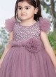 Girls Light Purple Gown In Net With Frill Sleeves