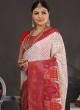 Beautiful Off White And Rani Banarasi Silk Saree