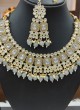 Elegant Natural Pearls And Mother Of Kundan Necklace Set