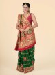 Elegant Green & Red Wedding Special Gharchola Saree