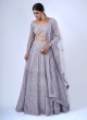 Striking Light Purple Heavy Embroidered Lehenga In Net