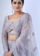 Striking Light Purple Heavy Embroidered Lehenga In Net