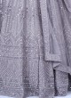 Striking Light Purple Heavy Embroidered Lehenga In Net