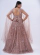 Attractive Mauve Sequins Embellished Gown With Cape Sleeves
