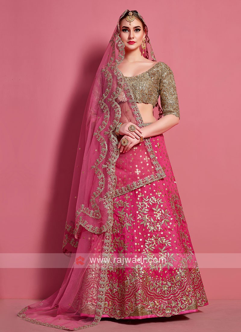 Buy a Rani Pink and Golden Yellow Bridal Lehenga For Wedding