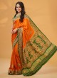 Exquisite Orange And Green Gharchola Gajji Silk Saree