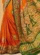 Exquisite Orange And Green Gharchola Gajji Silk Saree