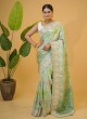 Enchanting Multi Color Banarasi silk Saree With Embroidered Border