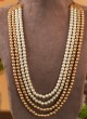 Golden And Off White Four Layered Pearl Mala