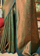 Dark Green Saree In Silk With Weaving Work
