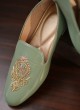 Pista Green Jutti In Leather With Zardosi Embroidered Motif