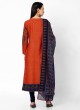 Rust And Navy Blue Color Churidar Suit