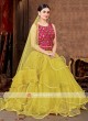 Attractive Yellow & Pink Net Lehenga Choli
