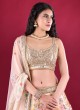 Wedding Wear Net Lehenga Choli In Peach Color