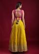 Yellow And Pink Zari Work Lehenga Choli