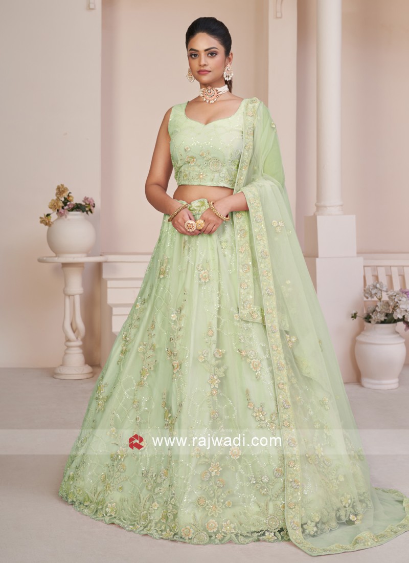 Fabulous Pista Green Color Soft Net Base Lehenga Choli For Mehendi Ceremony