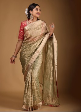 Attractive Golden Pista Color Saree With Zari Weaving Work