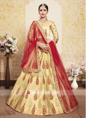 Beige Lehenga Choli with Red Dupatta