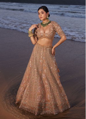 Bridal Wear Orange Heavy Embroidered Net Designer Lehenga Choli