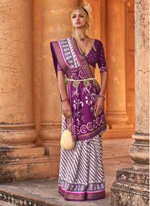 Dazzling Purple and White Patola Printed Silk Saree