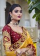 Delectable Silk Maroon and Yellow Embroidered Designer Traditional Saree